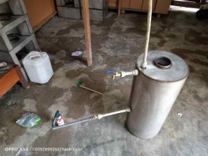 bình nóng lạnh củi chuyên lấy nước nóng